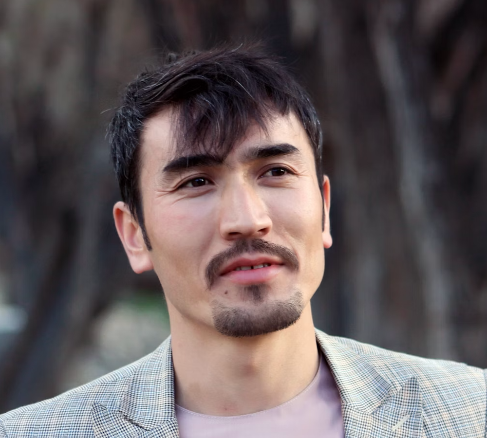 man in a gray jacket